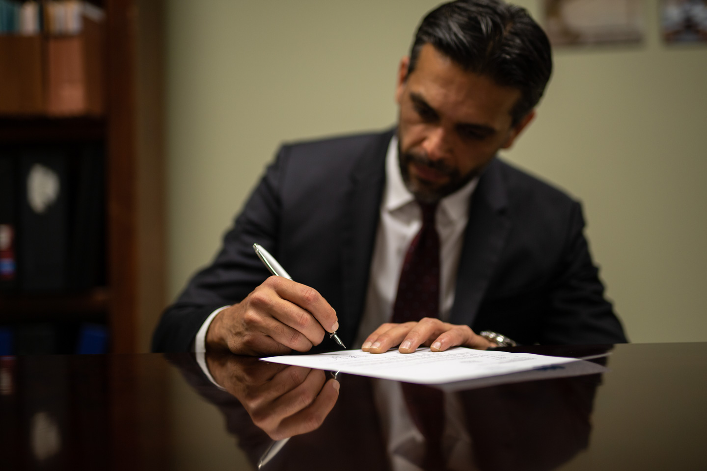 A lawyer signing a document